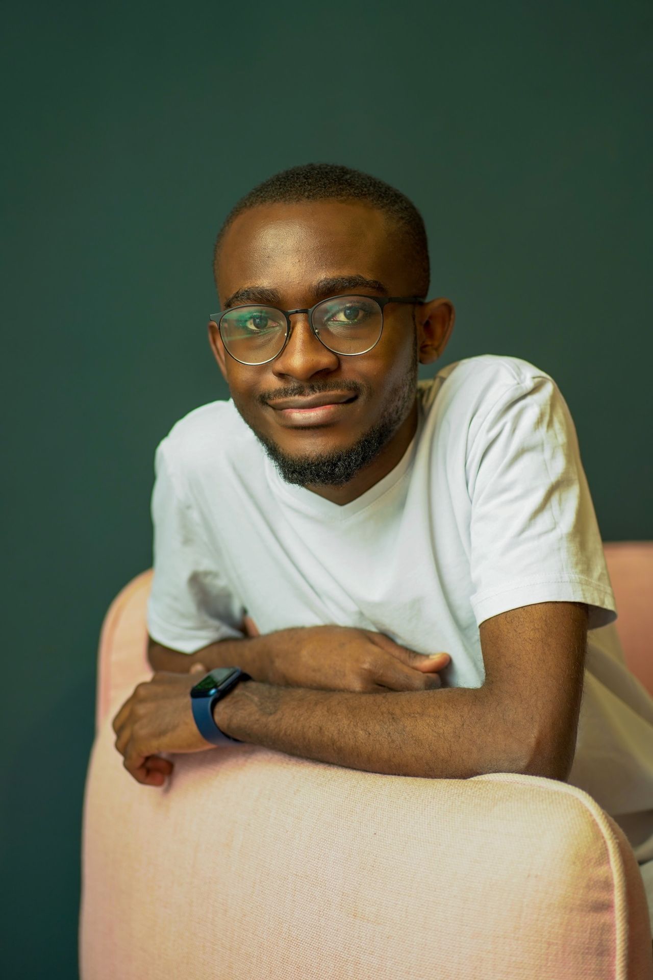 man in white crew neck t-shirt wearing black framed eyeglasses